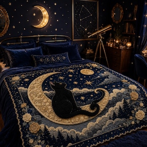May include: A dark blue blanket featuring a textured black cat sitting on a large, golden crescent moon. The design includes cream-colored roses, a starry night sky, and a forest silhouette at the bottom, all rendered in a detailed, woven style.