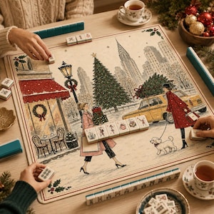 May include: A square mahjong mat featuring a festive New York City winter scene with a Christmas tree, a yellow taxi, and a person walking a dog. The mat includes a row of mahjong tiles with holiday-themed illustrations placed across the center.