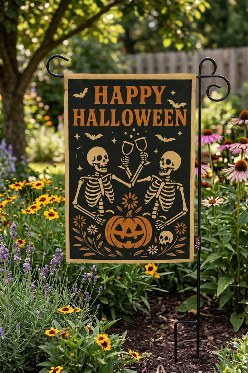 A Halloween-themed garden sign featuring two skeletons holding a jack-o-lantern and surrounded by flowers, with the text "HAPPY HALLOWEEN" displayed prominently.