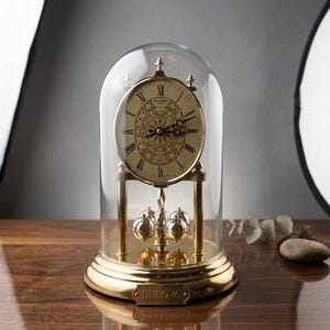 Vintage Bulova Quartz Anniversary Clock | Brass-Plated, Glass Dome, Rotating Pendulum