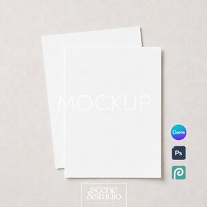 May include: Two stacked blank white rectangular cards in a vertical orientation. The top card features the word MOCKUP in light gray text. Three small square icons for Canva, Photoshop, and a logo are visible on the right side of the cards.