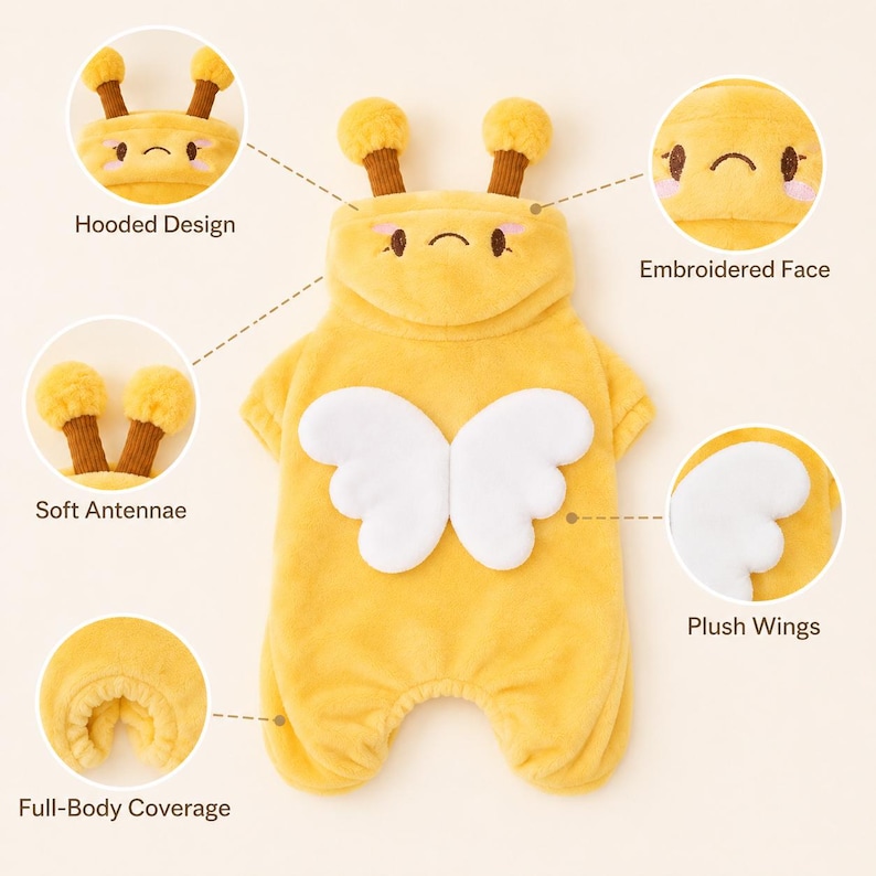 May include: A yellow plush pet costume featuring a hooded design with brown antennae, an embroidered face, white plush wings on the back, and full-body coverage. The garment includes text labels pointing to these specific features.
