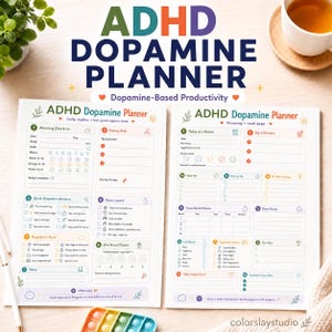 May include: Two white paper sheets titled ADHD Dopamine Planner with colorful sections for daily rhythms, priority paths, focus launches, and reward trackers. The pages feature numbered lists, checkboxes, and icons for tracking mood, energy, and daily tasks.