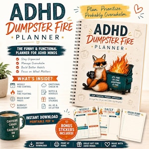 May include: A spiral-bound ADHD Dumpster Fire Planner featuring a fox wearing sunglasses next to a burning dumpster. The cover text reads ADHD Dumpster Fire Planner. Includes printable PDF pages for weekly fire control, daily fire fighting, and brain dump sections, plus bonus stickers. A dark green mug with text is also visible.