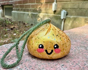 Gouden glitterdumpling kerstornament