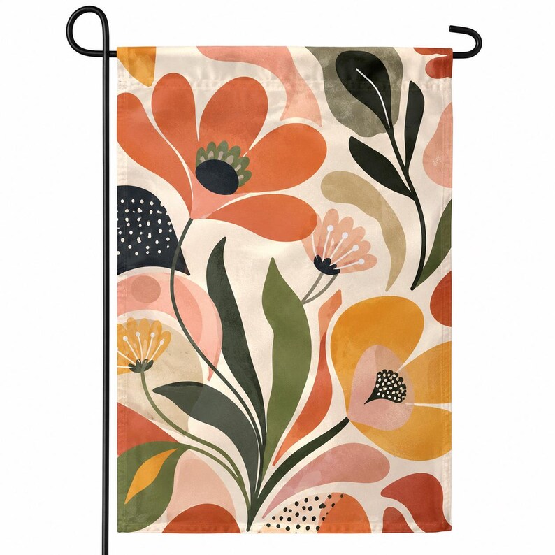May include: A rectangular garden flag featuring a botanical pattern with large orange, yellow, and pink flowers, dark green leaves, and abstract shapes on a cream background. The design includes small black dots and curved lines throughout the print.