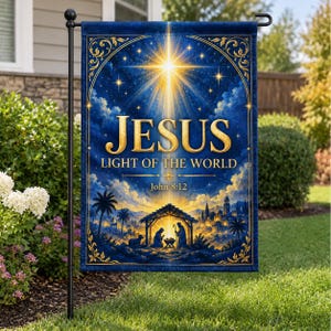 May include: A rectangular garden flag featuring a deep blue night sky with a bright star, a nativity scene, and gold text that reads JESUS LIGHT OF THE WORLD and John 8:12. The design includes ornate gold filigree borders on a dark blue background.