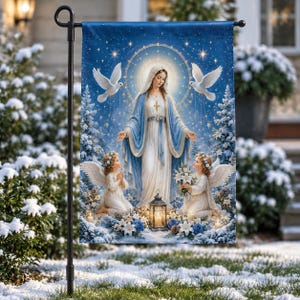 May include: A rectangular garden flag featuring a central illustration of the Virgin Mary in a blue and white robe, flanked by two kneeling angels with wings. The scene includes white doves, blue and white flowers, a lantern, and snowy trees.