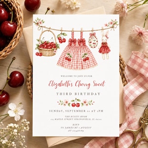 Op de afbeelding: Een witte verjaardagsuitnodiging met een aquarelillustratie van een waslijn met een mand vol kersen, een rood geruite jurk, een ei met kersenpatroon en een konijn. De tekst luidt Elizabeth's Cherry Sweet Third Birthday.