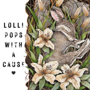 May include: Watercolor illustration featuring a sleeping rabbit nestled among lilies and tall grass. The artwork includes the text "Lollipops With A Cause" in bold, black letters, with a heart symbol. The color palette is soft, with earthy tones and floral accents.