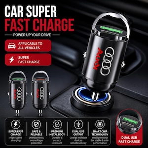 May include: A black metal car charger with the Audi logo, featuring dual USB ports, a silver pull-ring handle, and text including CAR SUPER FAST CHARGE, POWER UP YOUR DRIVE, APPLICABLE TO ALL VEHICLES, SUPER FAST CHARGE, and DUAL USB FAST CHARGE.