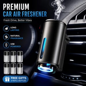 Puede incluir: Un ambientador de coche cilíndrico negro con un indicador de luz azul y una ranura vertical, montado en una rejilla de ventilación. El texto dice PREMIUM CAR AIR FRESHENER, Fresh Drive, Better Vibes, LONG LASTING, NATURAL FRAGRANCE, USB POWERED y FREE GIFTS 6 REFILL BOTTLES.