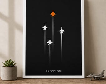 Pode incluir: Uma impressão artística emoldurada com fundo preto, apresentando quatro silhuetas de aviões de combate brancos e uma silhueta laranja, cada uma com um rastro de vapor vertical. A palavra PRECISION está impressa em branco no centro inferior.