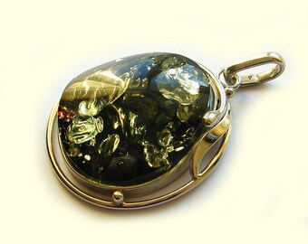 Genuine Baltic green amber pendant.