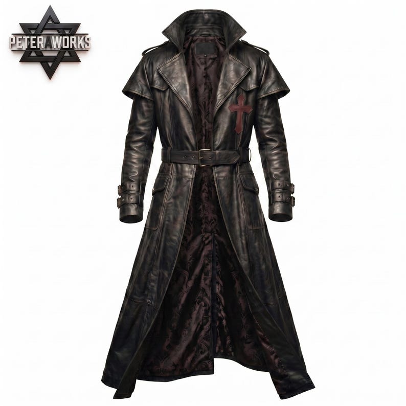 May include: A long black leather trench coat featuring a wide collar, a belted waist, and adjustable buckled cuffs. The coat displays a dark red cross emblem on the left chest and includes a dark patterned interior lining visible at the front.