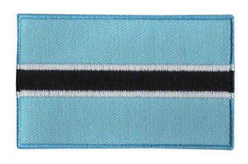 Botswana flag patch with light blue background and black stripe bordered in white.