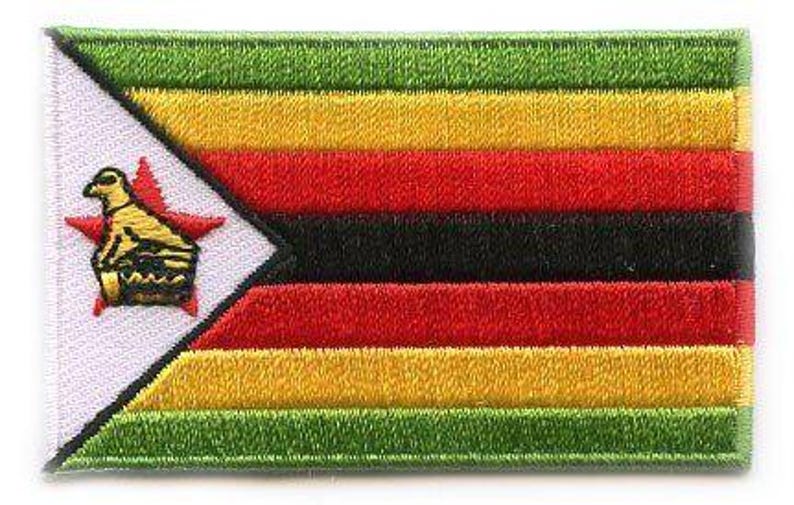 Zimbabwe flag patch featuring red, green, yellow, and black stripes with Great Zimbabwe bird.