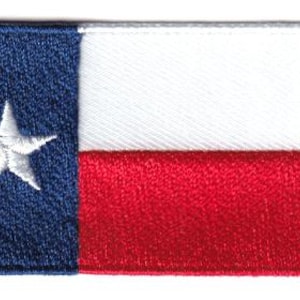 Toppa con la bandiera del Texas
