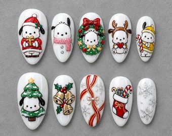 May include: A set of ten white press-on nails featuring 3D Christmas designs. The motifs include a puppy in a Santa suit, a snowman, a puppy in a wreath, a reindeer puppy, a puppy with a candy cane, a puppy in a tree, gold bells, ribbons, a stocking, and silver snowflakes.
