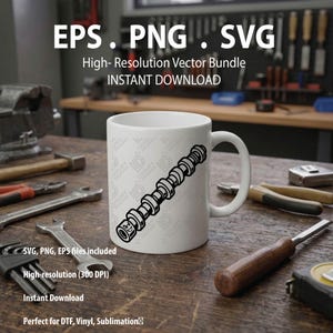 May include: A white ceramic mug featuring a black graphic illustration of a mechanical camshaft component. The mug is positioned on a wooden workbench surrounded by various metal hand tools including wrenches, pliers, and a tape measure.
