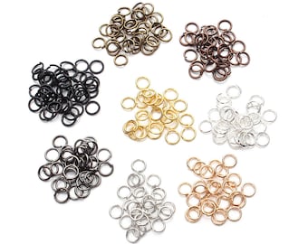 Puede incluir: Surtido de anillas de salto en varios colores, incluyendo oro, plata, bronce y negro. Las anillas de salto son pequeñas y perfectas para la elaboración de joyas.