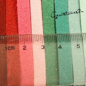 May include: A close-up of ten fabric swatches in various colors, including red, pink, green, and blue. The swatches are lined up next to each other and measured with a ruler in centimeters. The text "Gemstones2u" is visible in the top right corner of the image.