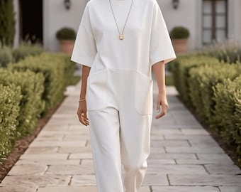 Minimalistischer Overall mit weitem Bein für Frauen, übergroßer Einteiler mit hohem Hals, Kurzarm-Strampler mit Taschen, lässiger schwarzer Overall