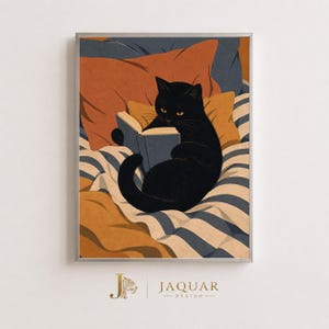 May include: A framed art print featuring a black cat reading an open book while resting on a pile of pillows and a blue and white striped blanket. The pillows are colored in shades of orange and yellow. The text JAQUAR DESIGN appears below.
