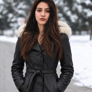 Women’s Black Leather Coat with Fur Hood, Belted Winter Trench Coat, Button Front Long Leather Outerwear with Pockets