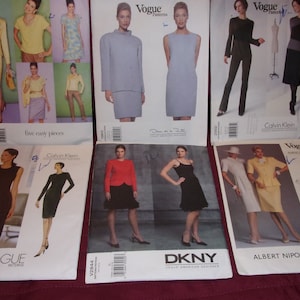 May include: A collection of nine sewing patterns for clothing, including a dress, a skirt, a blazer, and a jumpsuit. The patterns are from various designers, including Vogue, Calvin Klein, DKNY, and Albert Nipon.