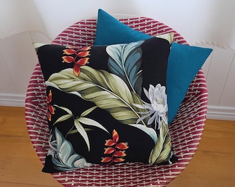 Tropical barkcloth cushion cover (orchids and heliconias) – black