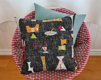 Tiki barkcloth cushion cover in black/duck egg blue