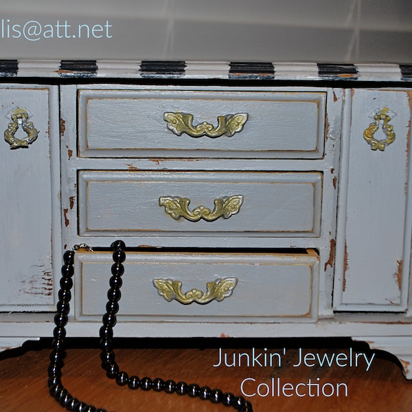 Medium size jewelry box, refinished with blue color paint, stenciled and sealed.  Distressed and has a rustic feel