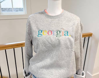 Sudadera bordada con el estado