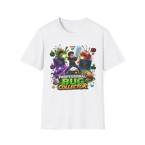 May include: A white short-sleeve t-shirt featuring a graphic print of a person holding a keyboard, surrounded by colorful cartoon monsters, code windows, and the text "PROFESSIONAL BUG COLLECTOR" in bold green and yellow lettering.