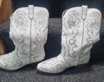 Hand Places Rhinestoned Cowboy Boots