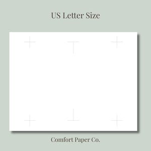 Op de afbeelding: Een wit rechthoekig vel papier in US Letter-formaat met dunne grijze registratietekens aan de boven- en onderrand. De tekst US Letter Size staat bovenaan gedrukt en de tekst Comfort Paper Co. staat onderaan gedrukt.