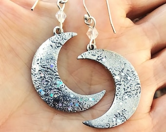 Crescent moon earrings in sparkling iridescent silver