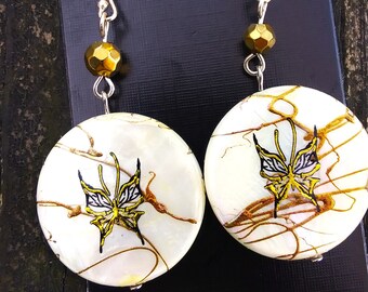 Large golden/black butterfly on mother of pearl disc earrings with antiqued gold beading