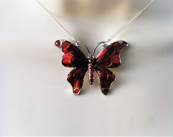 Red butterfly necklace in silver with an 18 inch chain