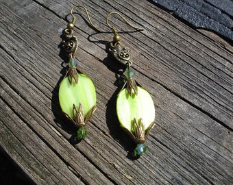 Green earrings with antique bronze accents and mother of pearl