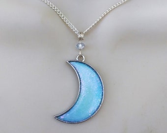 Crescent moon necklace in pastel sparkling sky blue