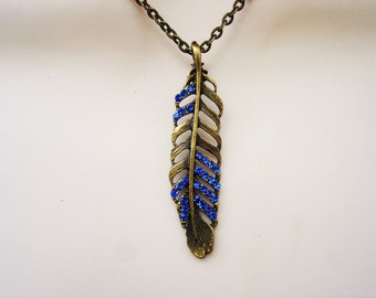 Blue sapphire swarovski crystal bronze feather necklace