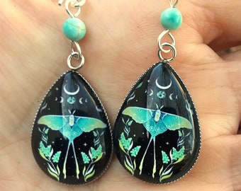 Moth and crescent moon teardrop earrings in turquoise blue and black