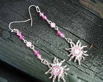 Pink sun/star burst long earrings