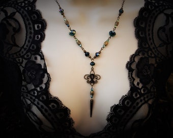 Fleur de lis spike necklace in teal green and antiqued bronze 28 inch long necklace