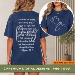 May include: A navy blue short-sleeve t-shirt featuring white text on the back that reads: be anxious for nothing but in every thing by prayer and supplication with thanksgiving let your requests be made known unto God. Philippians 4:6-7.