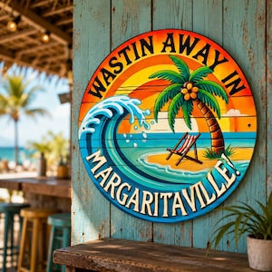 May include: A round wooden sign featuring a colorful beach scene with a palm tree, a crashing blue wave, and a red and white striped beach chair. The text reads WASTIN AWAY IN MARGARITAVILLE in bold black letters against a yellow and orange sunset.