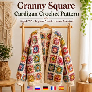 Puede incluir: Un cárdigan de ganchillo hecho de cuadrados granny multicolores con ribetes acanalados de color crema. El texto dice: Granny Square Cardigan Crochet Pattern, Digital PDF, Beginner Friendly, Instant Download. Cuelga de una percha de madera.