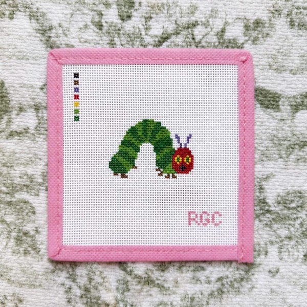 Tela ricamata a punto croce con bruco - Collezione Bug Club